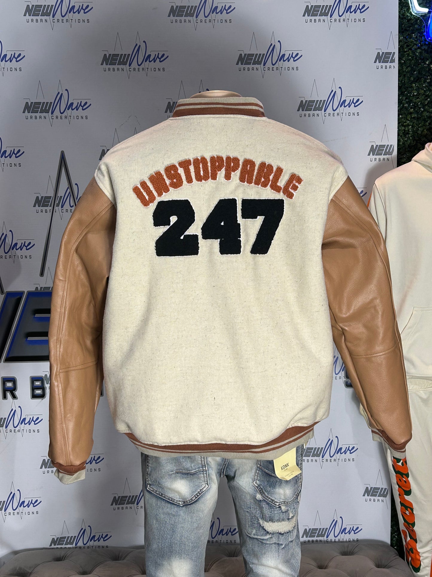 Unstoppable grind varsity jacket